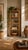 A beautiful vintage five-tier étagère featuring a tall, open-frame silhouette fully wrapped in natural rattan with woven...
