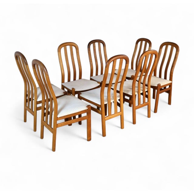 This set of eight 1970s Skovby dining chairs embodies the refined craftsmanship and sculptural presence of Danish Modern...