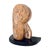 Vintage mid-century modern abstract sculpture carved in warm-toned travertine and mounted on a polished dark granite base....