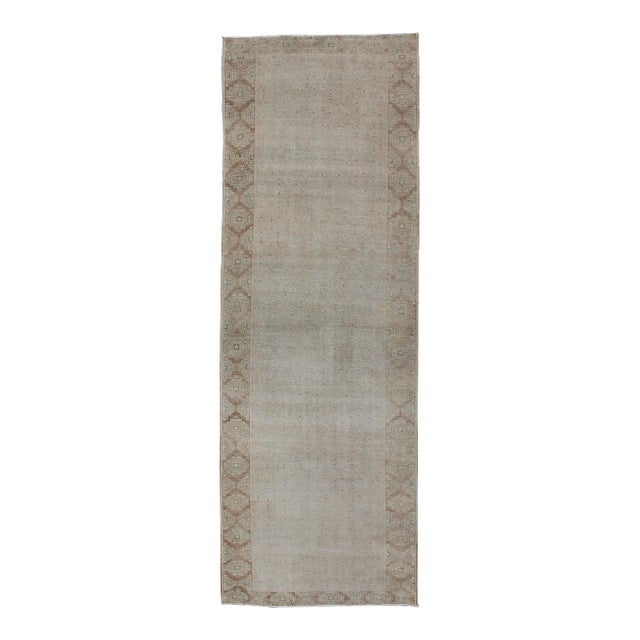 Floral All-Over Medallion Vintage Turkish Oushak Runner With Faded Color Palette For Sale