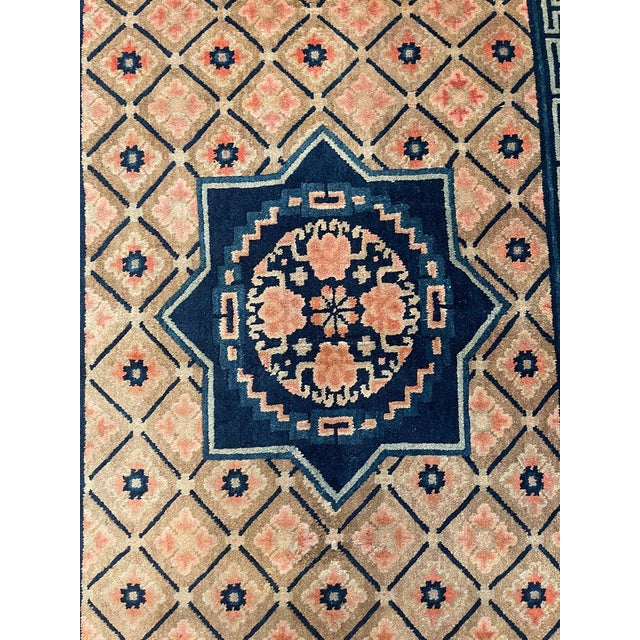 This distinctive antique Chinese rug from the early 20th century, circa 1900s, measures approximately 7'2" x 4'5" and...