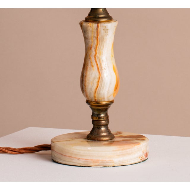 A Beautiful solid Onyx & Antique Brass table lamp, carefully restored to its former glory. Rewired with antique brass...