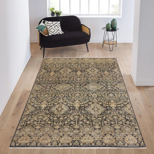"Enhance the ambiance of your home with this magnificent Persian-influenced Turkish hand-knotted rug made by skilled...