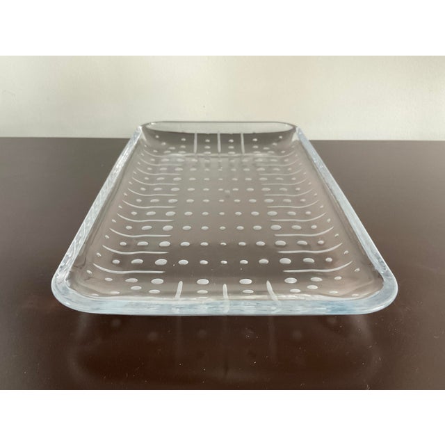 Fun and functional glass serving tray featuring a charming dot pattern. Whether you're hosting a cocktail party or simply...