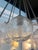 This stunning light features one light bulb and 8 seeded glass bulbs to catch and disperse the light. Although it's small,...