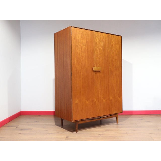 A stunning wardrobe by renowned furniture maker G Plan as part of their Danish range, this Mid Century Modern Vintage Teak...