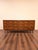 Gorgeous mid century modern lowboy by Broyhill Lenoir. Features stunning walnut veneers with burled wood accents, 9 smooth...