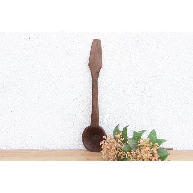 There is something deeply soulful about a simple wooden spoon—especially one carved by hand to feed a village. This...