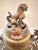 A vintage bronze censer with rich cloisonné enamel decoration throughout, worked in blue, red, green, and white against a...