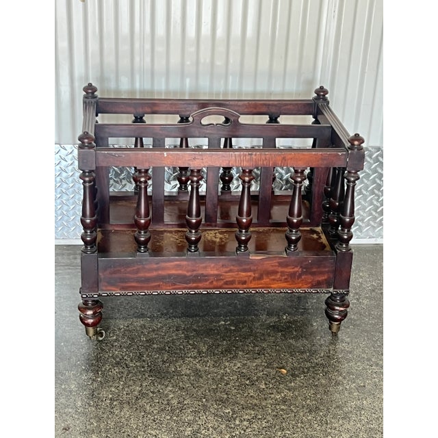 Large 19th C English Canterbury With Wheels sold as found with original finish showing normal signs of wear to finish .