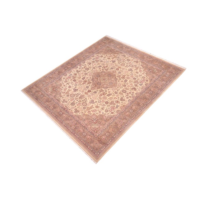 Designed with mesmerizing intricacy and gorgeous color palette, this hand-knotted masterpiece demonstrates the beauty and...