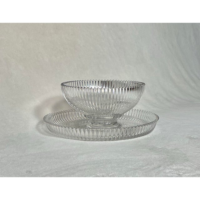 Vintage elegant ribbed textured glassware, footed bowl with a matching shallow under bowl. Clear heavy glass, vertical...