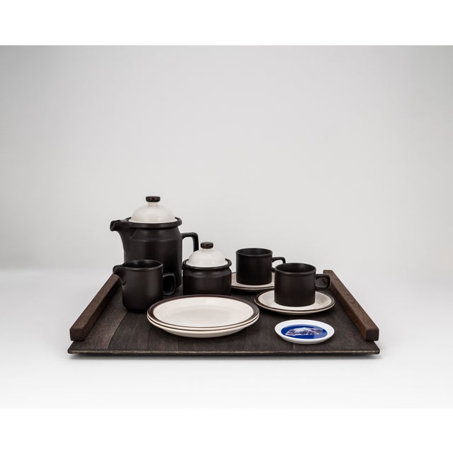 Brutalist. Elegant for two. Clear. Expressive. Timeless. At its core is a ceramic service by Doverstone Staffordshire, a...