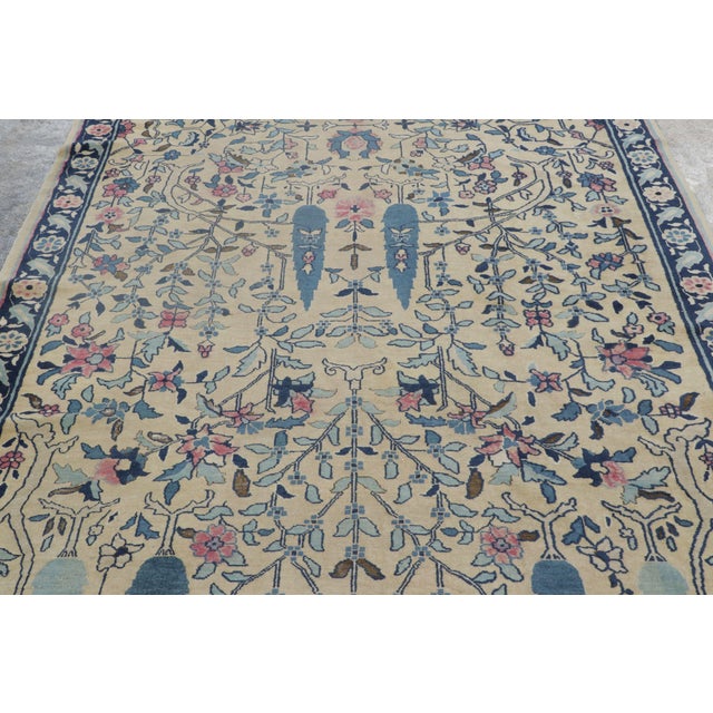 Hand-knotted in wool circa early 20th century, this 6x16 Chinese Peking rug exemplifies the clarity and spaciousness of...