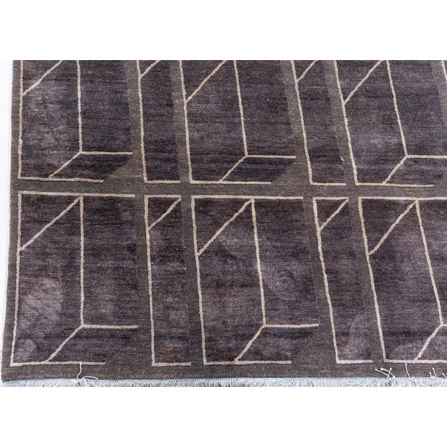 The contemporary geometric rug from Doris Leslie Blau is a modern masterpiece that seamlessly blends artistry with...