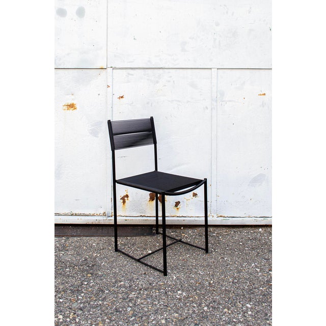 Chairs with lacquered metal frame, PVC seat and backrest. Spaghetti Chair Designer Giandomenico Belotti Manufacturer Alias...