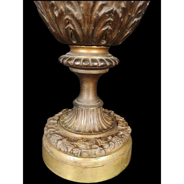 Renaissance jug from the XIX century. Jug in patinated and gilded bronze with work in relief allegory to astronomy....