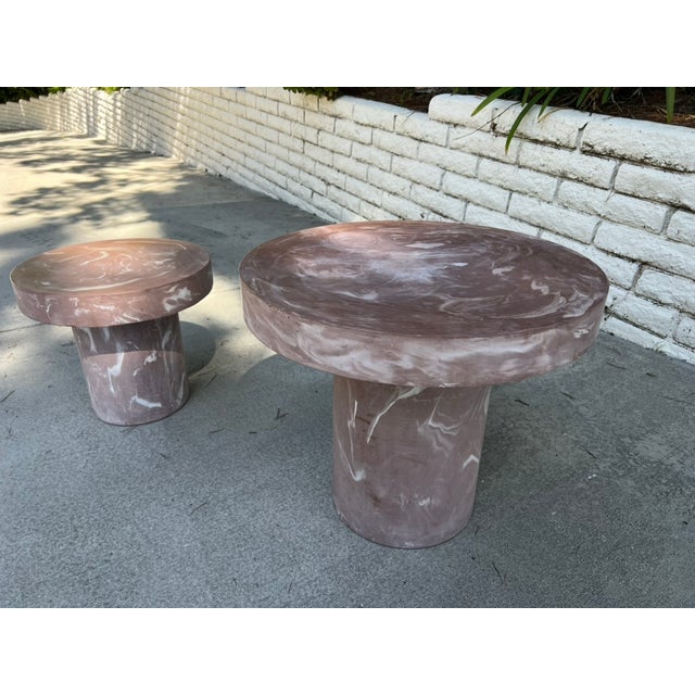 Pair of 1980s Postmodern Mauve Resin Faux Marble Swirl Pedestal Tables A striking pair of Postmodern pedestal tables...