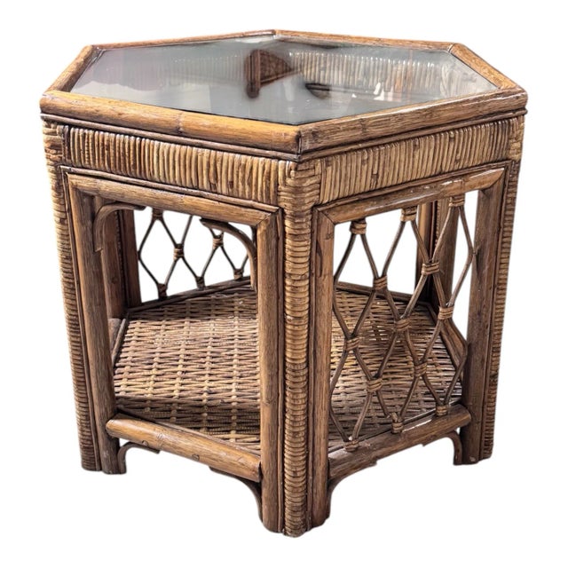 Unique Vintage Hexagon End Table Features: - Oversized rattan and wicker frame with natural elegance - Durable glass top...