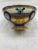This is a beautifully delicate Pickard China bowl that is hand painted with a gold interior and base. The exterior is...