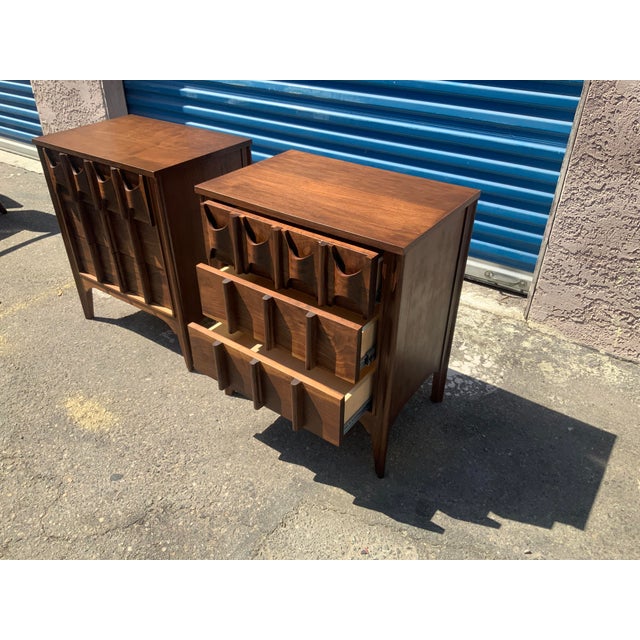 Stunning solid walnut mid century night stands. The pieces have 3 drawers. The modern mid century stand is well made and...