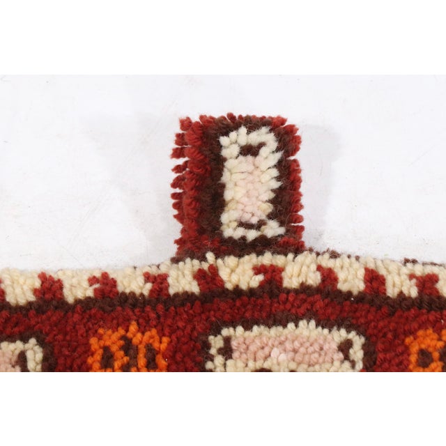 Groovy hooked rug style 1970's wall hanging, in the manner of an antique tribal rug. This example is in excellent,...