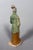 Sculpture of a Mingqi Servant, China, Ming Dynasty (1368-1644). Terracotta sculpture with green and brown glaze. Depicts a...