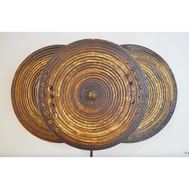 This Scandinavian ceramic wall lamp from the 1970s was produced by the Danish company Axella. The decorative wall lamp...