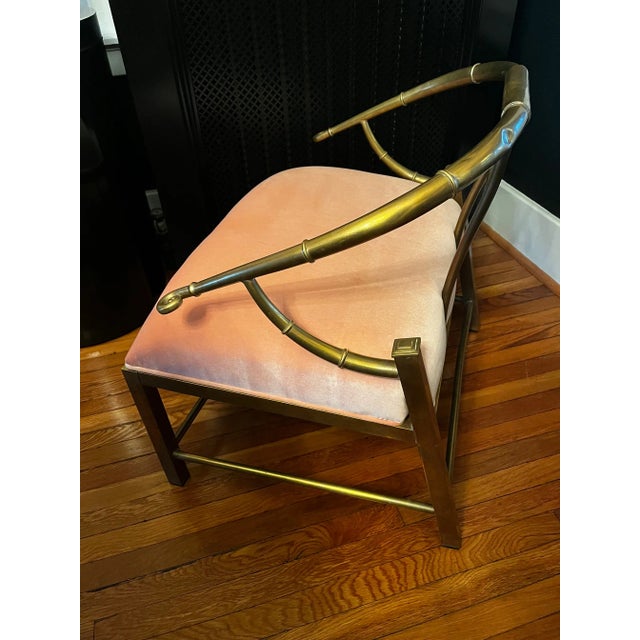 Mastercraft brass empress chairs that has been reupholstered in a rich salmon velvet. They have also been polished, but...