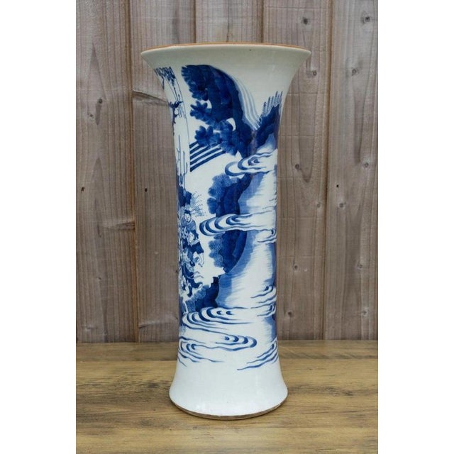 An impressive large Chinese porcelain sleeve vase, distinguished by its elegant elongated form and richly painted...