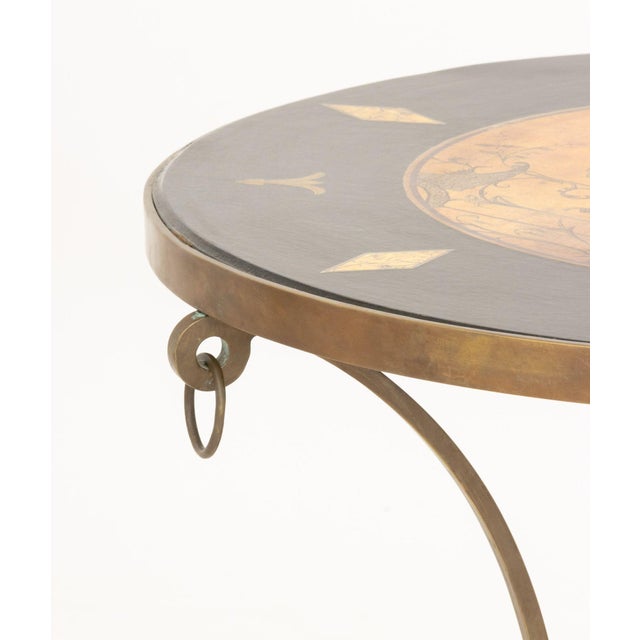 Sarreid Ltd. Chinoiserie Brass Gueridon, with ebonized and decoupage circular top and undertier on three paw feet. label...