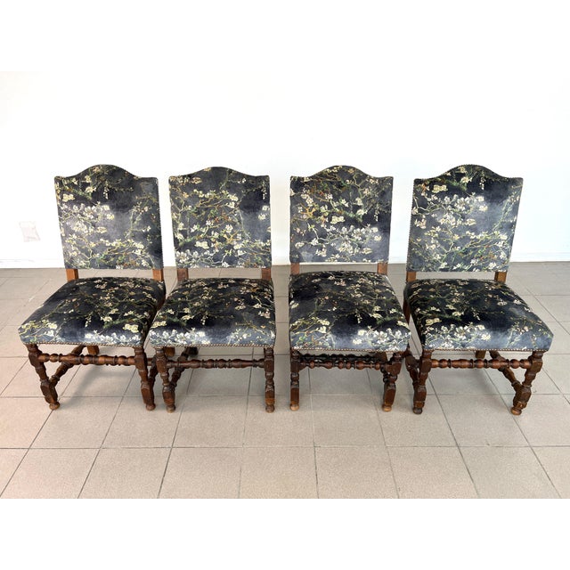 Dimensions: H 39.5” x W 20”/19” x D 25.5”/23.5” x SH 19” Set of 4 Vintage Louis XIII style dining chairs, upholstered in...