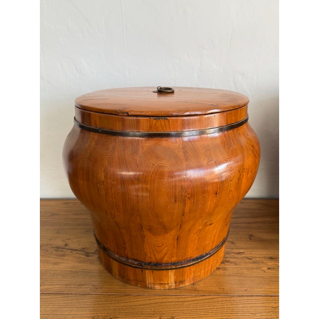 Details: - Origin: China - Period: Late 19th – Early 20th Century - Materials: Solid elm wood, iron banding, metal ring...