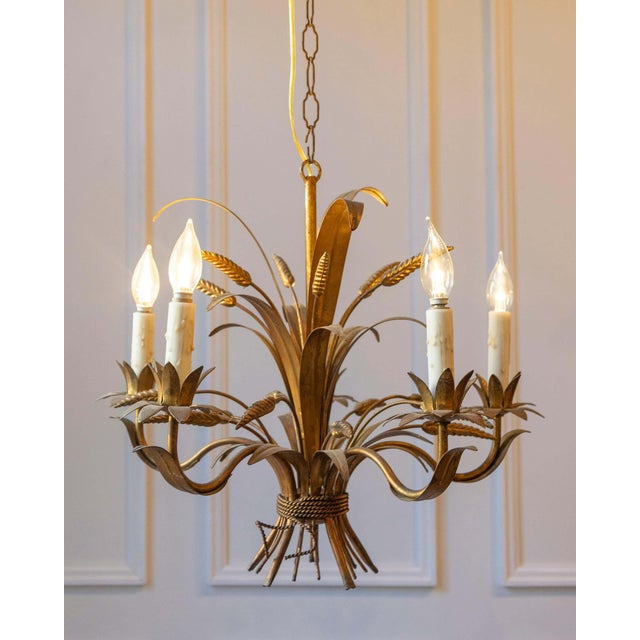A sculptural 20th-century French wheat sheaf chandelier inspired by the iconic style of Coco Chanel, who famously...