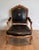1950s Queen's armchair in carved walnut upholstered with black leather and iron-Gi For Sale - Image 12 of 12