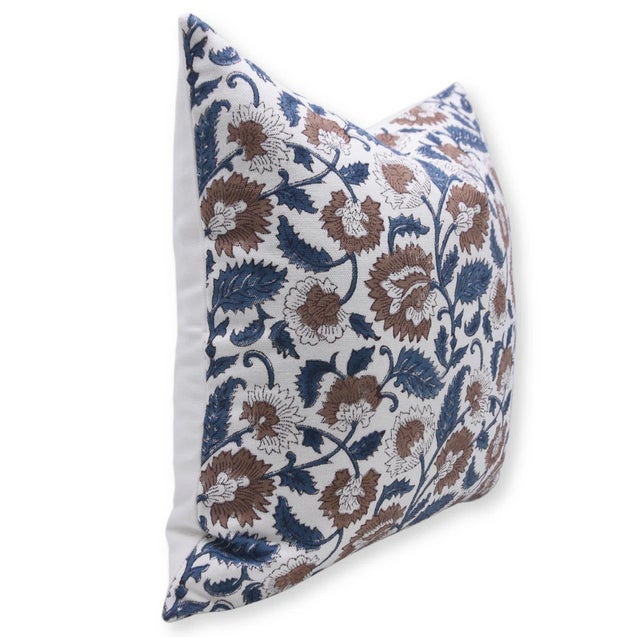 Add a touch of artisanal elegance to your home with this block print handmade cushion cover. Made from thick white cotton,...
