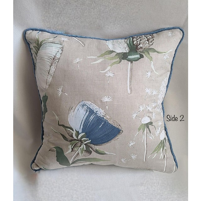 18”x18” pillow in Clarence House printed linen, trimmed in Samuel & Sons blue piping pillow insert is alternative down...