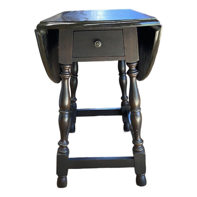Dark Brown Drop Leaf Accent Table With Turned Legs and Drawer For Sale