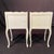 Elegant pair of French Louis XV painted nightstands with cabriole legs, molded (dovetailed) drawer fronts, and carved...