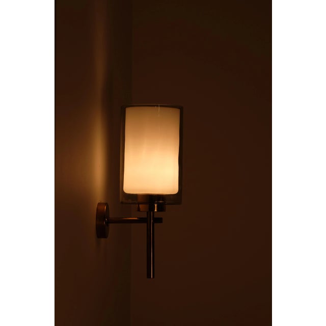 Brass and glass wall lights, produced in Sweden, 1950s. 6 available. Up to 250V (Europe/UK Standard).The wiring of this...