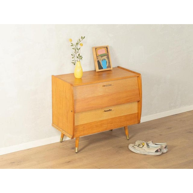1950s Mid-Century Shoe Cabinet Made in Germany Width: 70 cm Height: 63 cm Depth: 37 cm This piece has been carefully...