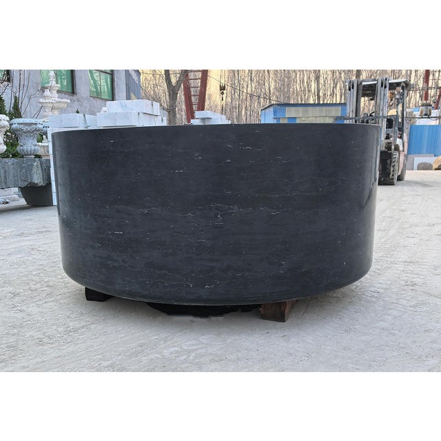 Style: Custom-made Round Limestone Bathtub * Material: Black limestone. * Surface: Honed finish. * Dimensions: 59" in...