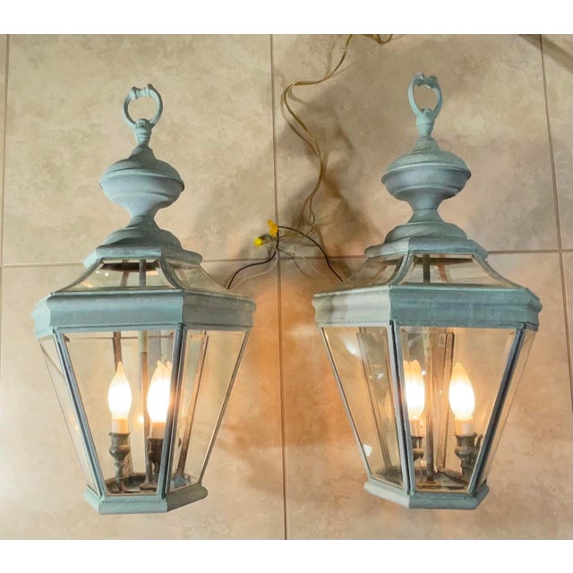 Elevate Your Space with Timeless Charm. These exquisite pair of vintage brass wall hanging lanterns will add a touch of...