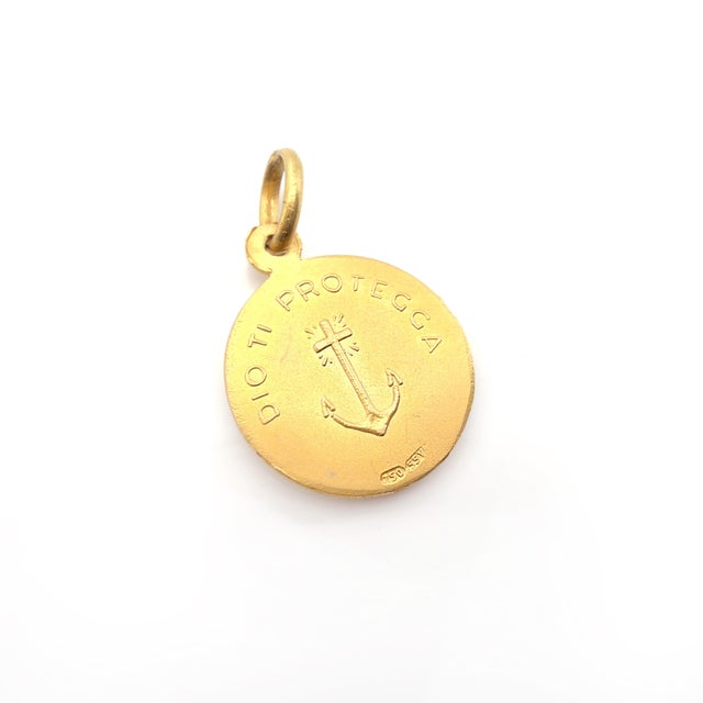 About This Charm: A timeless religious mini medallion circa 1960s, featuring Jesus Christ with an Italian blessing "Dio Ti...