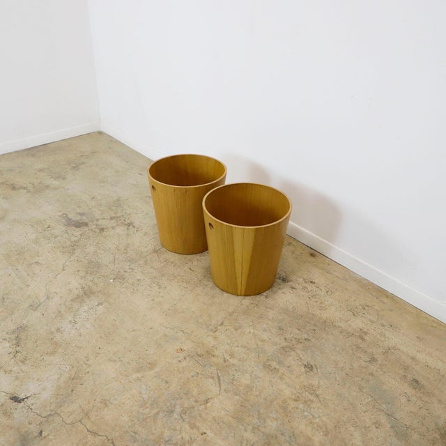 Circa 1960, We offer this Pair of mid century Plywood trash can. Recently restored.