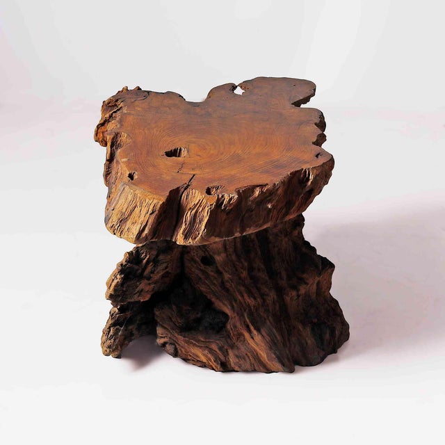 Mid century, vintage live edge burlwood coffee table, which features a sculptural, natural root base and a polished slab...