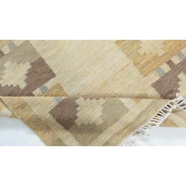 Mid-20th Century Swedish flat woven rug Size: 5'3" × 7'8" (160 × 233 cm) This charming mid-century vintage Swedish flat-...