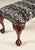 Handcrafted in Italy, this upholstered bench features a rectangular cushioned seat supported by carved cabriole legs. A...