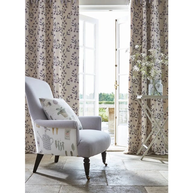 A delicately embroidered trail of flowering wild chamomile this fabric plays with matt and shine and is a beautifully...