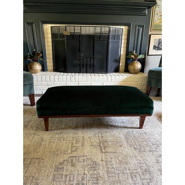 Elevate your home with this striking vintage Mid-Century Modern upholstered bench, showcasing timeless craftsmanship and a...